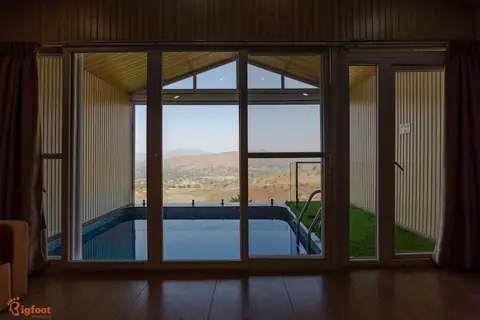 Glass doors opening to private pool