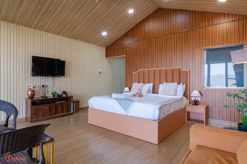 Spacious bedroom with seating area