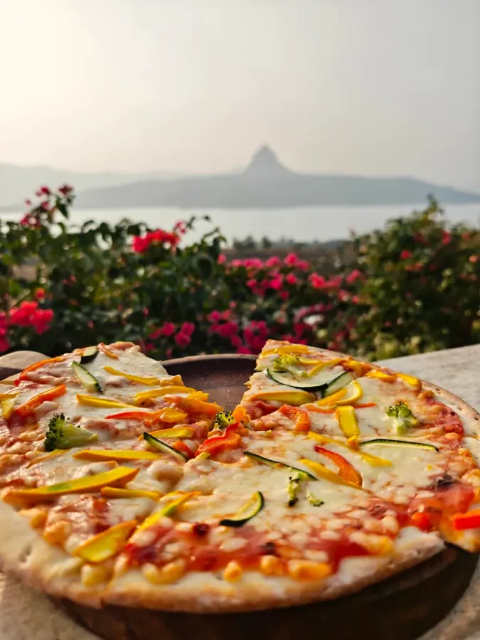 Food served with the lake in the background at Sundowner