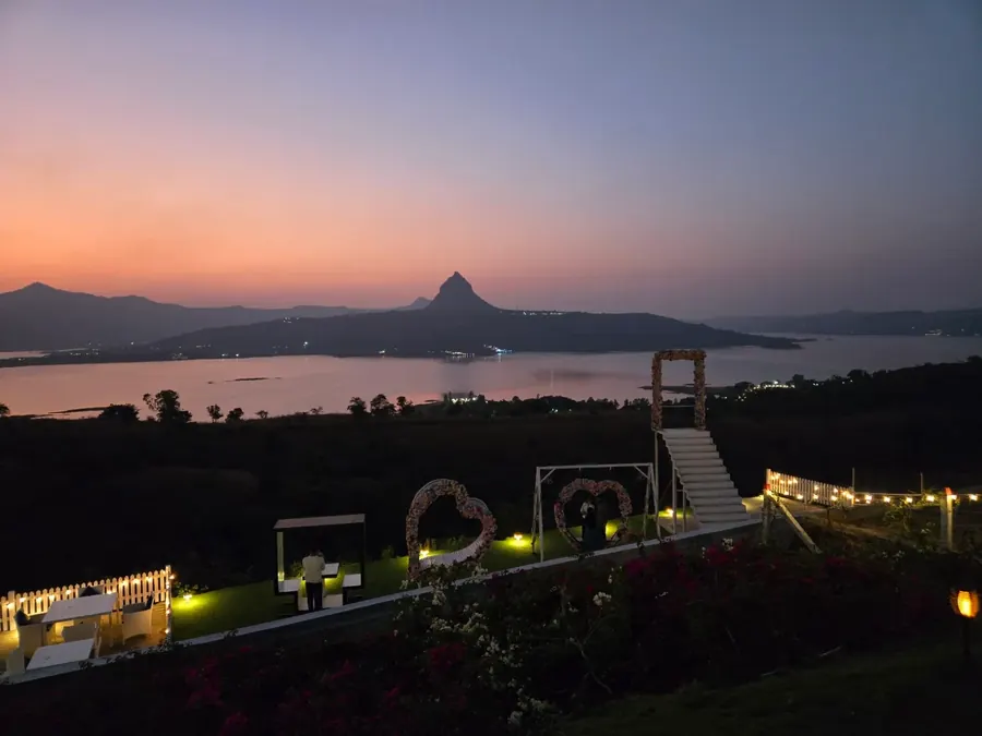 Sundowner restaurant in the evening overlooking Pawna Lake